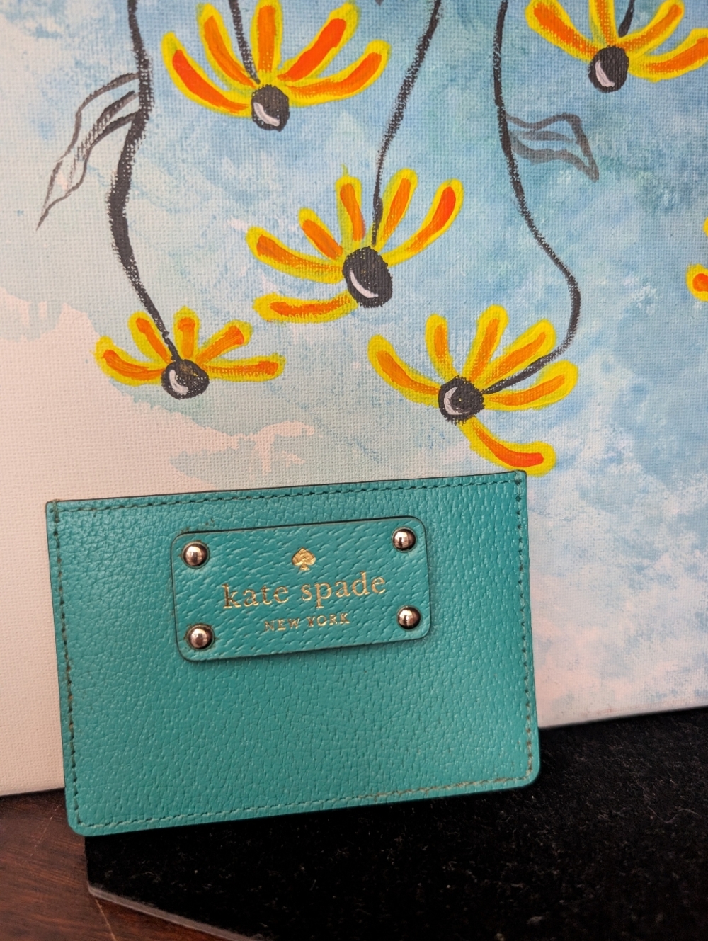 kate spade turquoise card holder with gold-tone logo